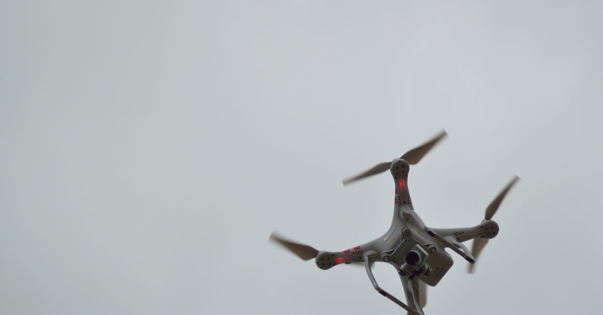 Flying through Frankfurt to Croatia - passport control - Gray Quadcopter on Flight