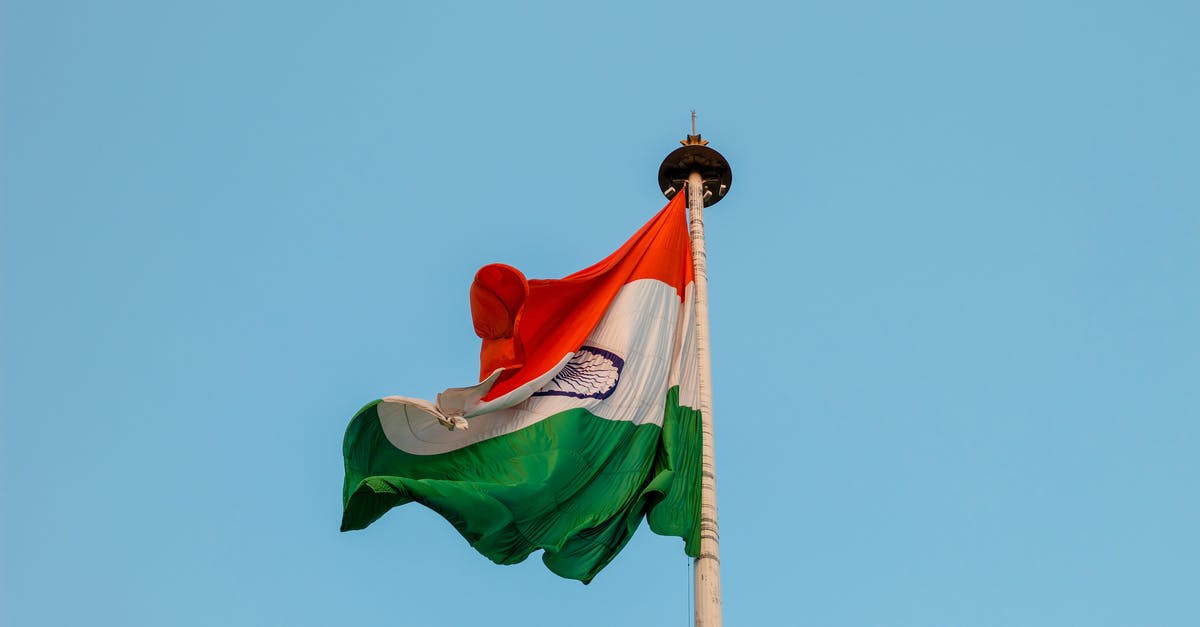 Flying to India - visa and country closure - Photo of a Flag in a Pole Being Blown by Air