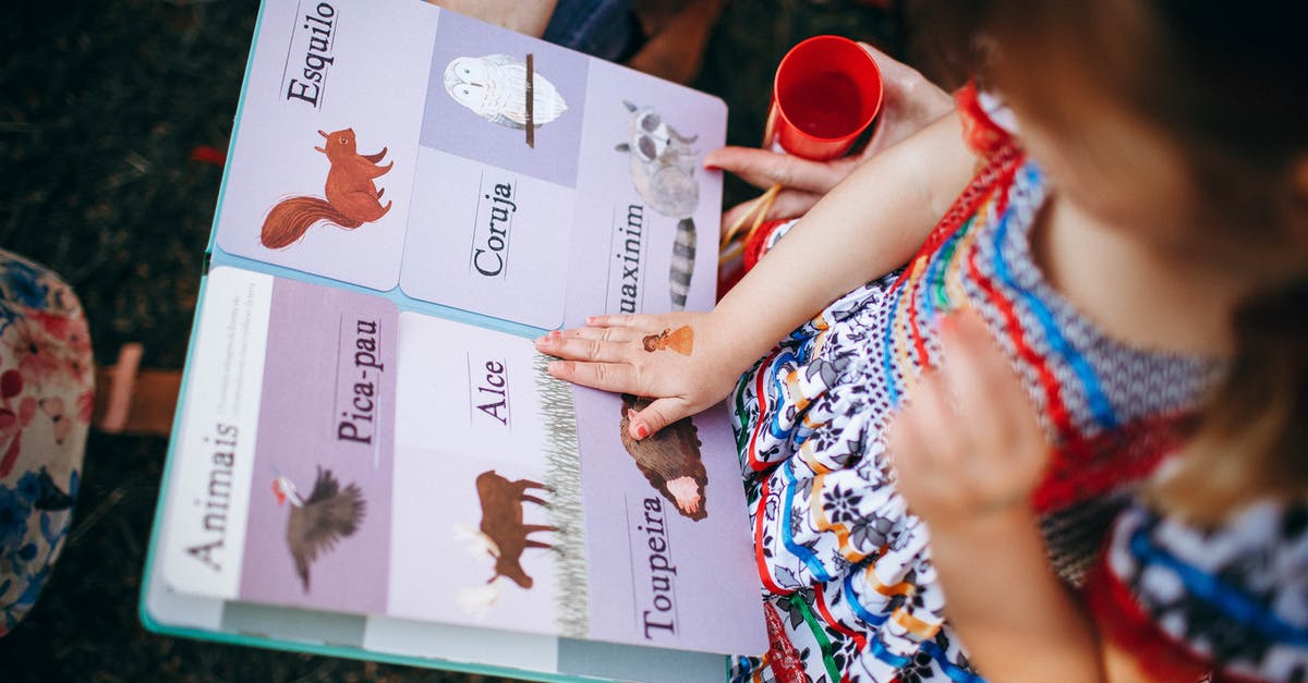 Flying to Wien, Austria from Denmark, legal with only temporary passport? - Child reading book with mother in garden