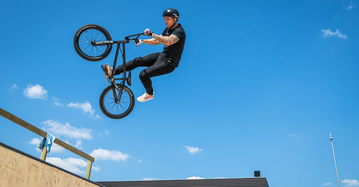 Flying with a bicycle with Swiss/Austrian/Brussels airlines - Cyclist Acrobat Performing Bike Stunts