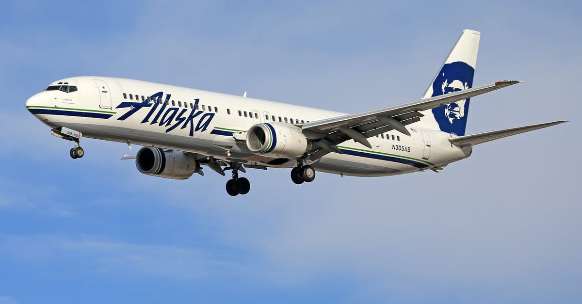 Flying with a bicycle with Swiss/Austrian/Brussels airlines - Alaska Airlines Plane in the Sky