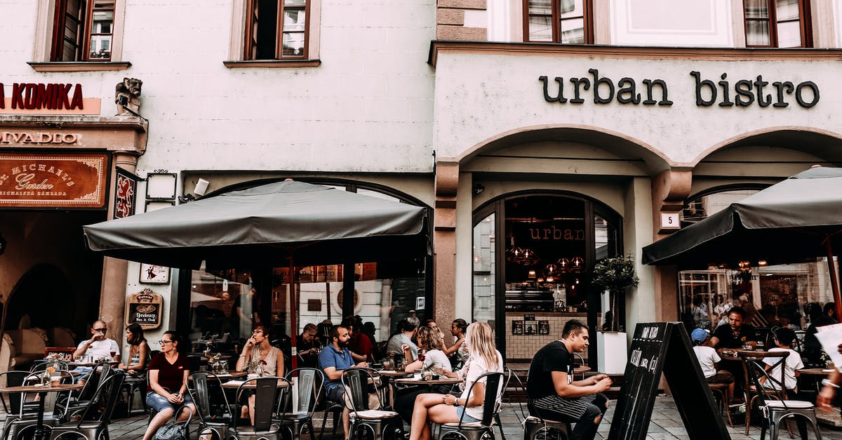 Food Allergies in Europe - Street cafe with people and tables