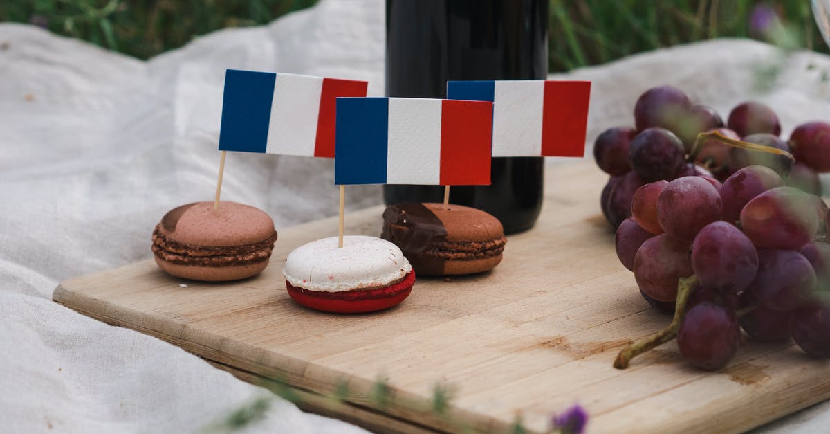 Food on the TGVs between France and Spain? - Macarons on Brown Wooden Chopping Board