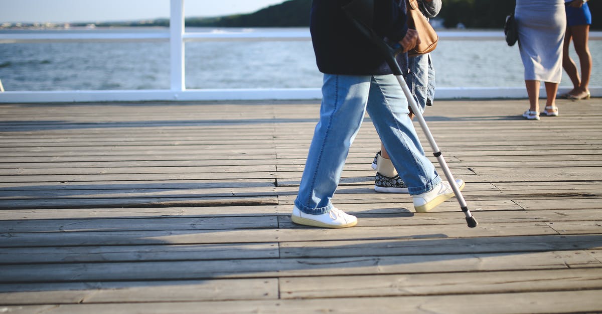 Forearm walking crutch and air travel - Woman with a crutch