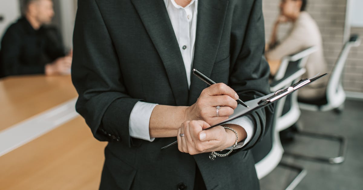 Formal Obligation [closed] - Man in Black Suit Jacket Holding Silver and Black Pen