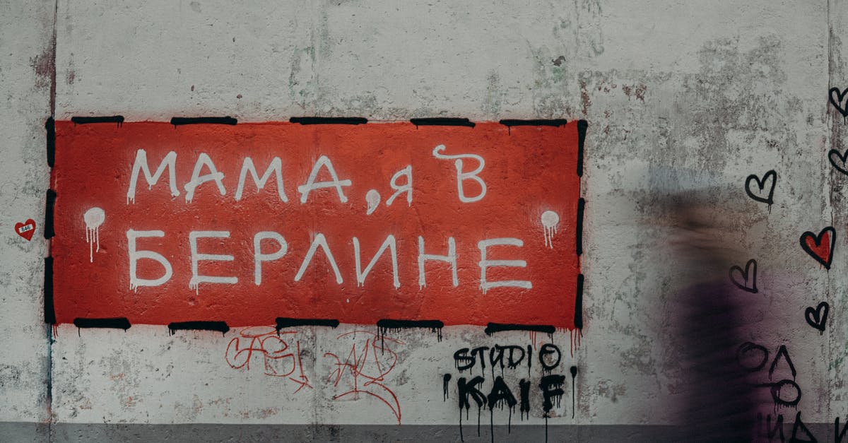 French street language in mugging situation - Red and White Wall Mounted Signage