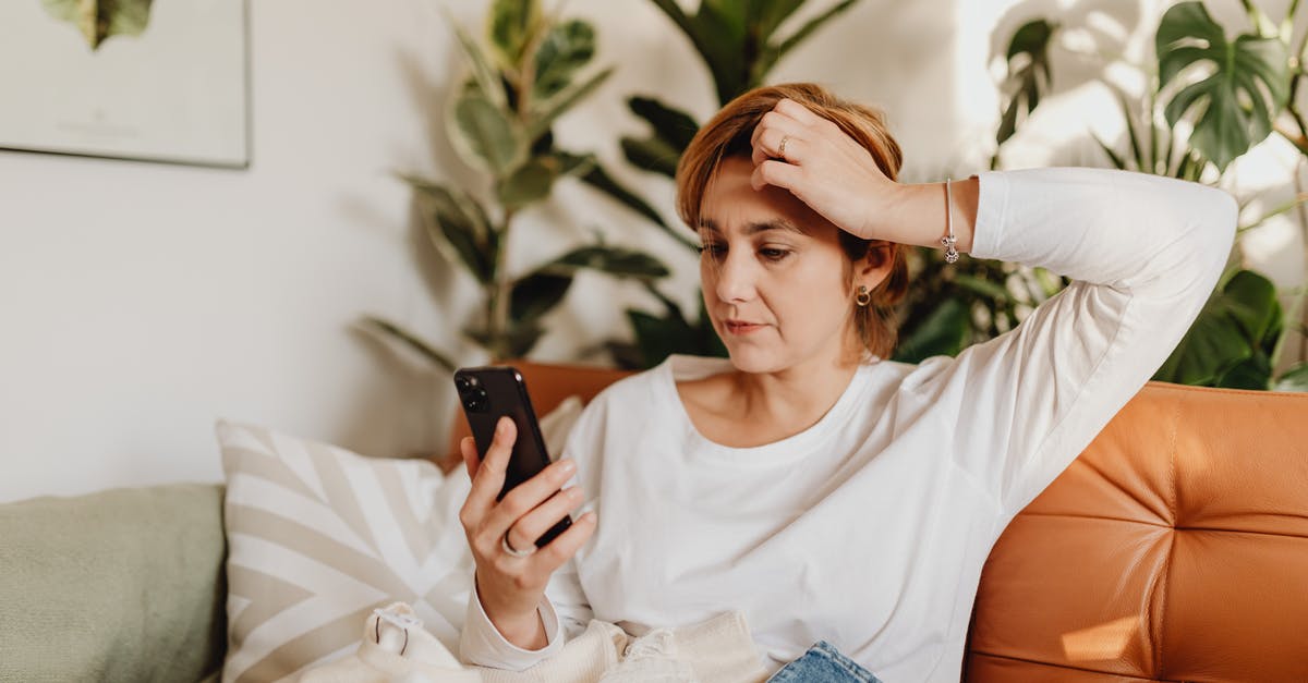 French visa confusion - Woman in White Crew Neck T-shirt Holding Black Smartphone