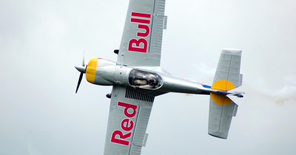 Frequent Flyer (Downgrading) - Gray Red Bull Monoplane on Mid Air