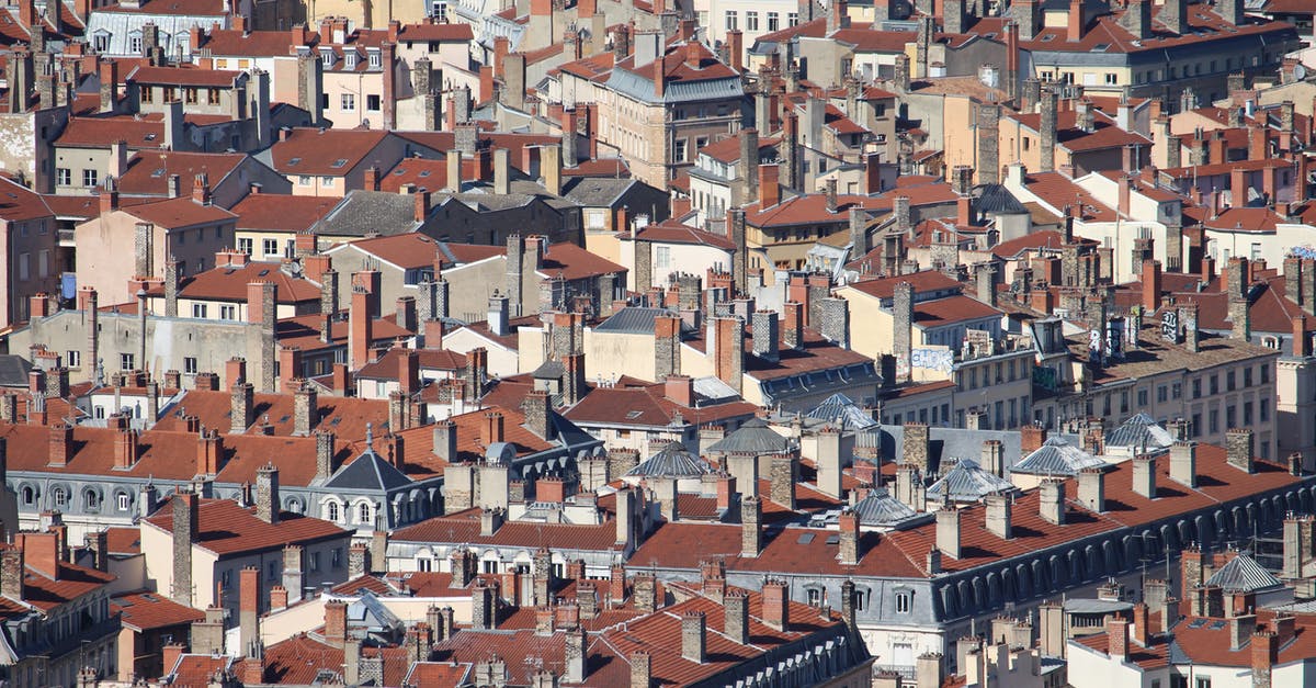 Gare de Lyon to CDG on November 3-4, 2018 - Drone Shot of Houses and  Buildings with Chimneys 