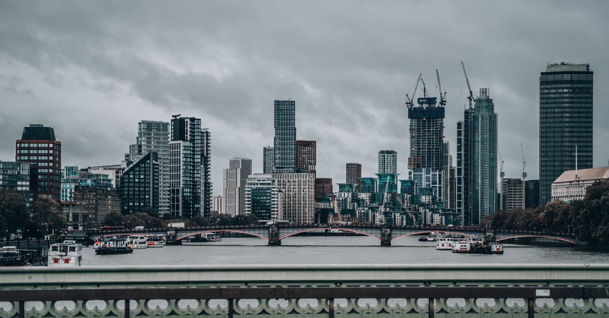 Gatwick to London [duplicate] - City Skyline Under White Cloudy Sky