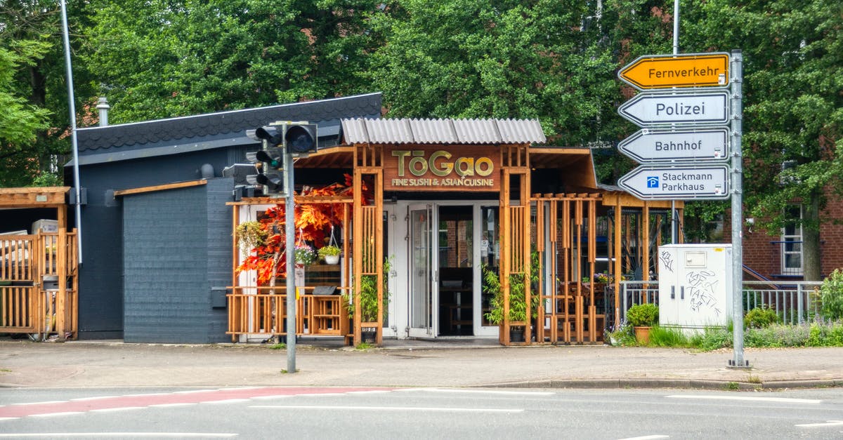 Georgia/Tbilisi restaurant etiquette - Brown and White Wooden Store