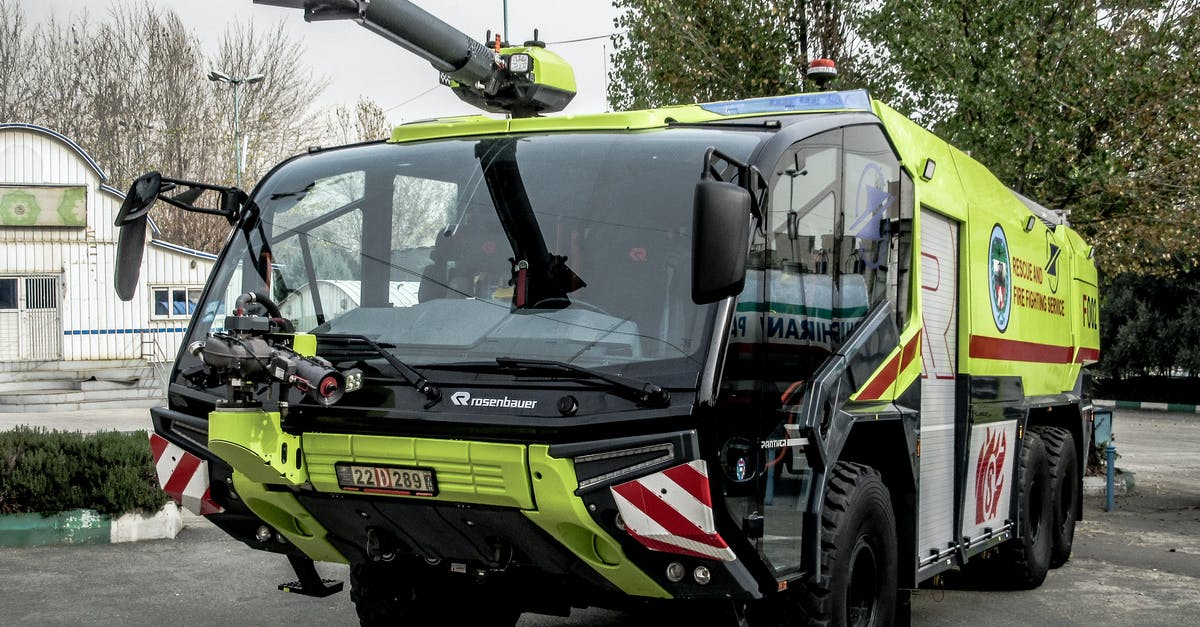 German Emergency Visa - Green and Black Police Car on Road