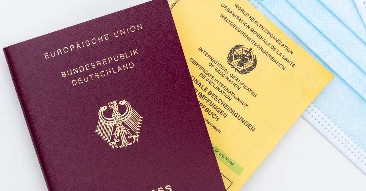 German national visa (Type D), but entry through another Schengen country? - Red and Gold Book on White Table