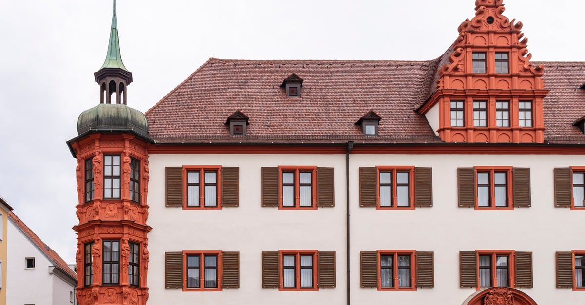 Germany family visit visa refusal and new tourist visa application [duplicate] - White and Brown Concrete Building