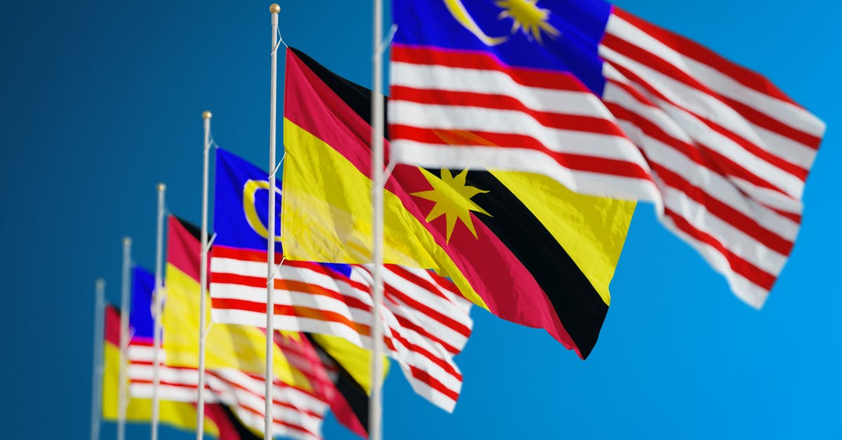 Get U.S Visa in Malaysia - Flags Raised High in the Flag Poles
