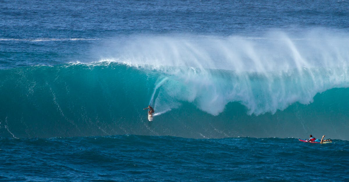 Getting from Honolulu to Mauna Kea - Person Surfing on Ocean Waves