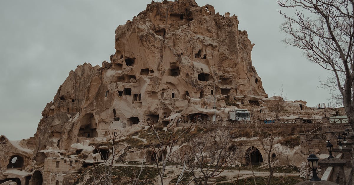 Getting to Cappadocia: Nevsehir or Kayseri Airport? - Mountain with carved houses in national park