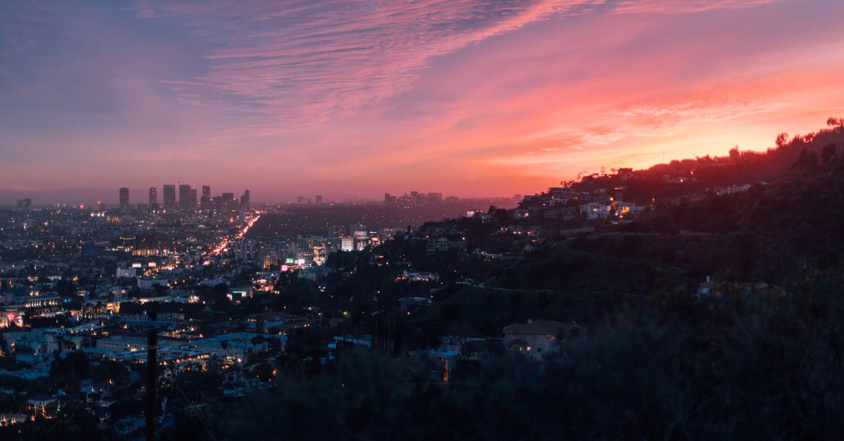 Getting to La Tomatina - City Near Mountain During Golden Hour