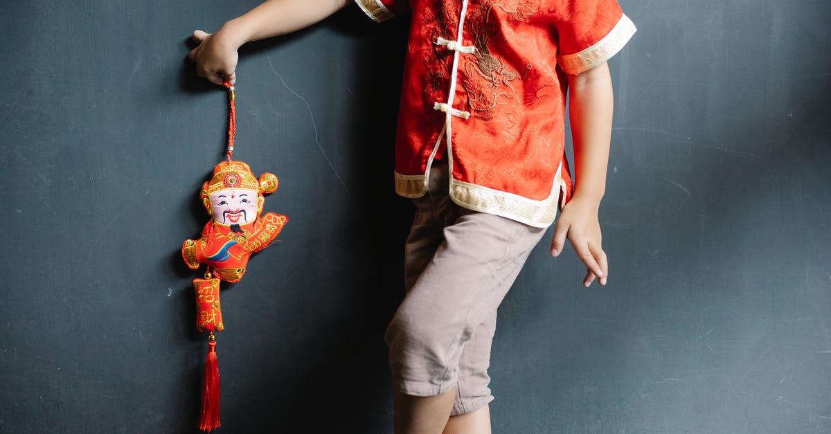 Gifts for Chinese hosts? - Little boy with Chinese toy for New Year