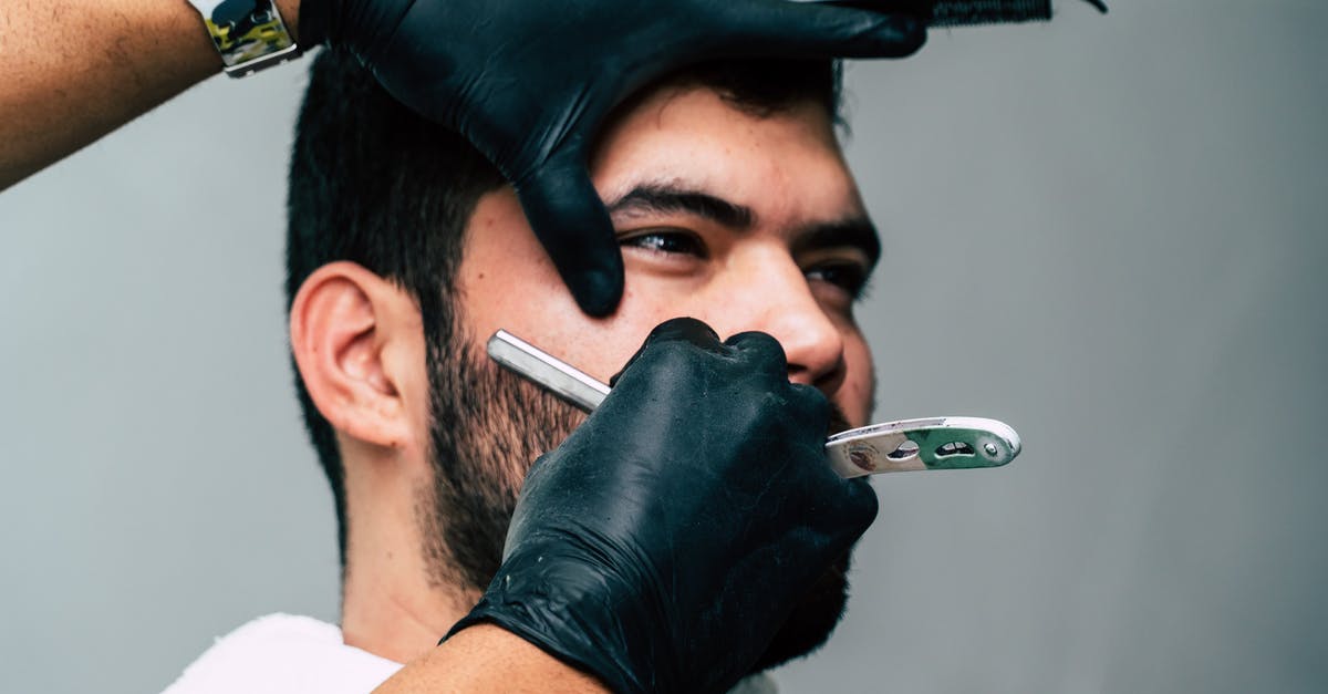 Gillette shaver on board? - Person Shaving a Man's Face With Straight Razor