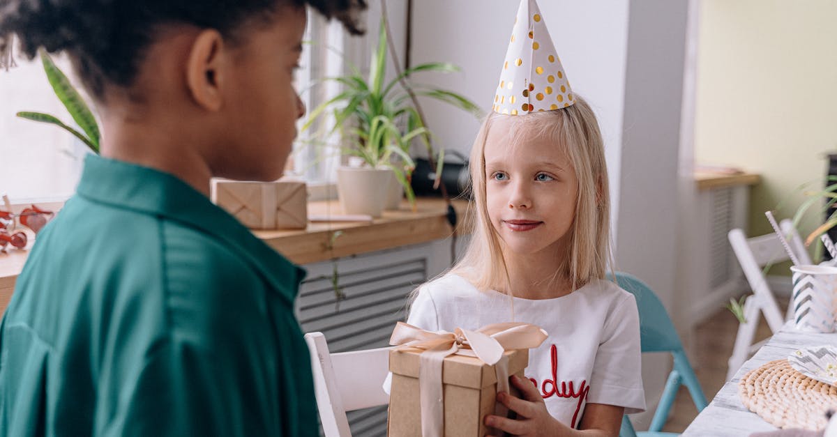 Giving details to Airbnb host - Girl Giving a Gift to a Friend at the Birthday Party 