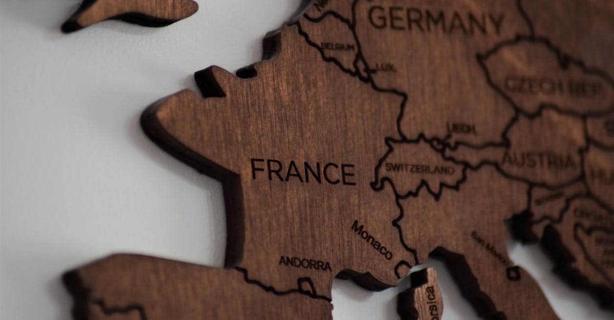 Going back-and-forth between Belgium and Germany on a Schengen visa - Close-Up Photo of Wooden Jigsaw Map