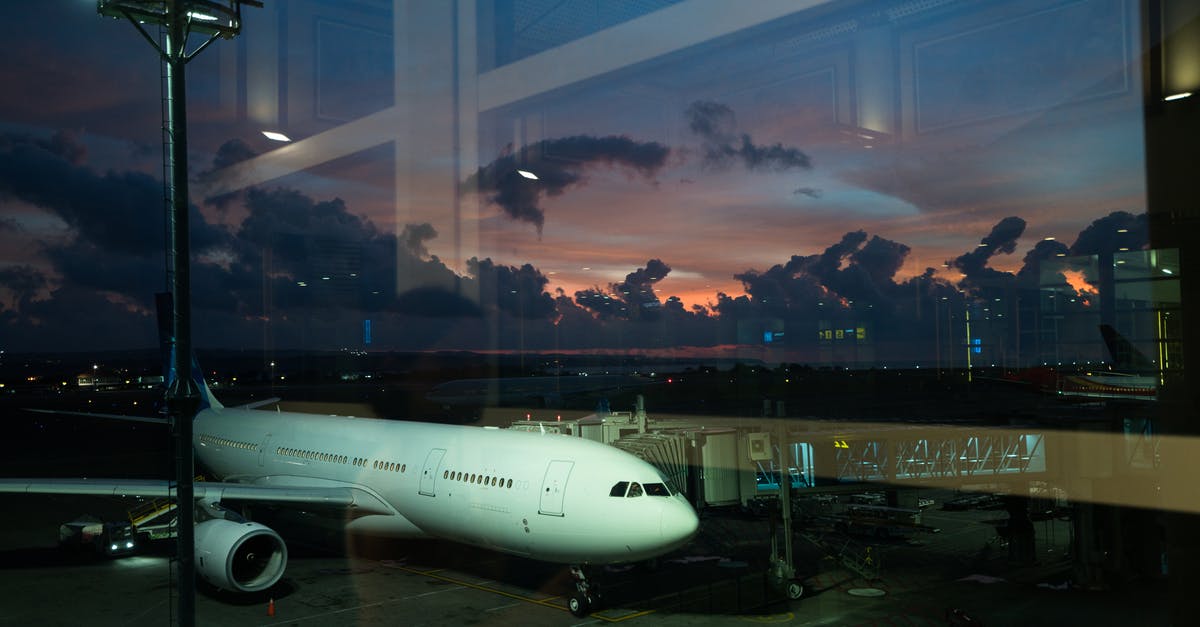 Going through security at Ft. Lauderdale on a connecting flight - Airplane connected to airport terminal with airbridge