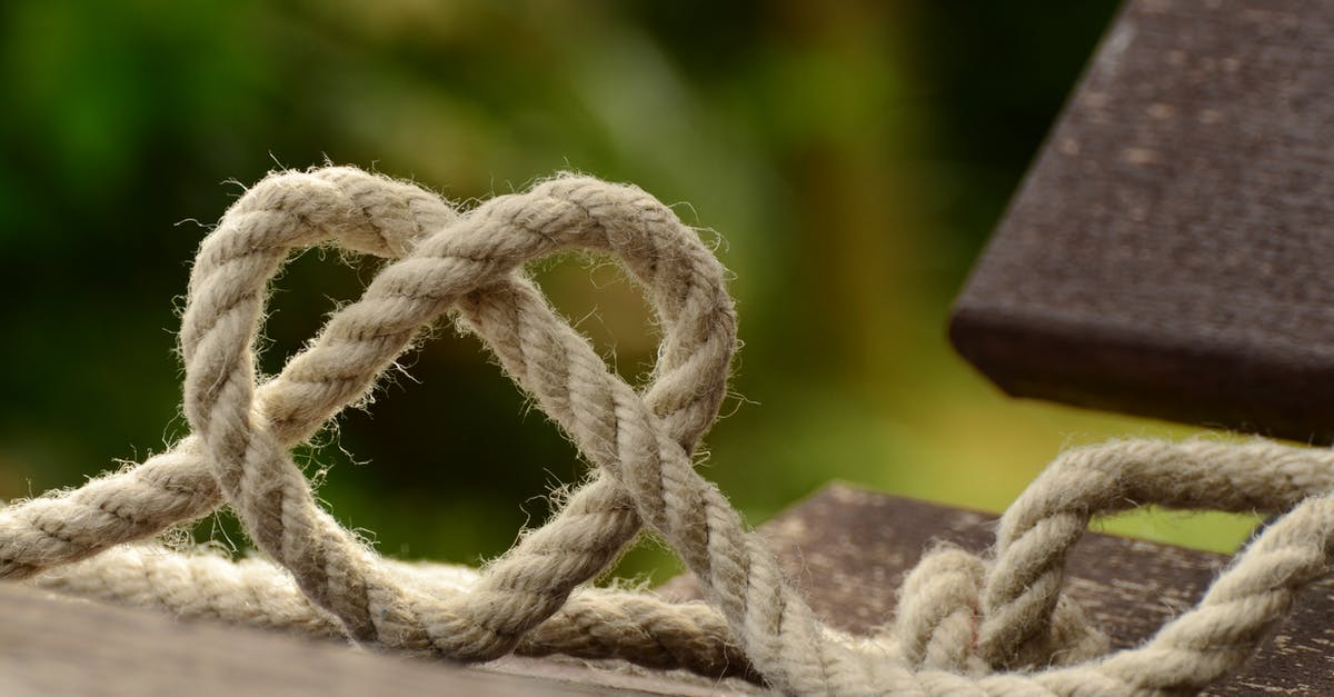 Going through security at Ft. Lauderdale on a connecting flight - Brown Rope Tangled and Formed Into Heart Shape on Brown Wooden Rail