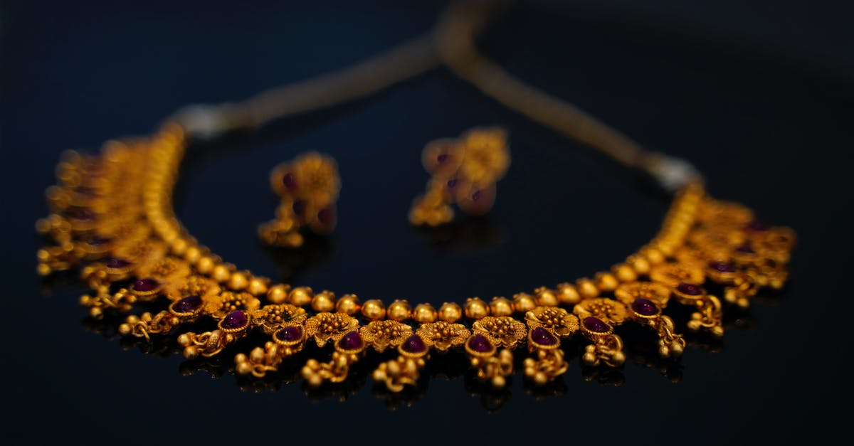 Gold Jewelry - Any limit? - Gold and Silver Beaded Necklace