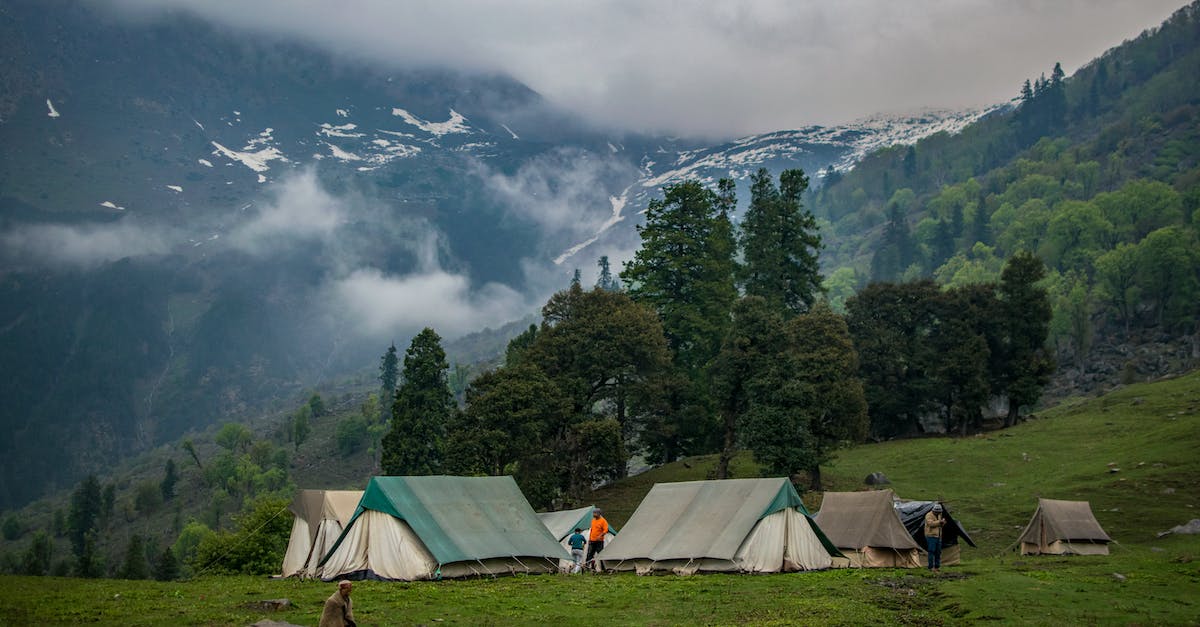 Good mountains to camp on in Japan - Green and White Tents Near Trees