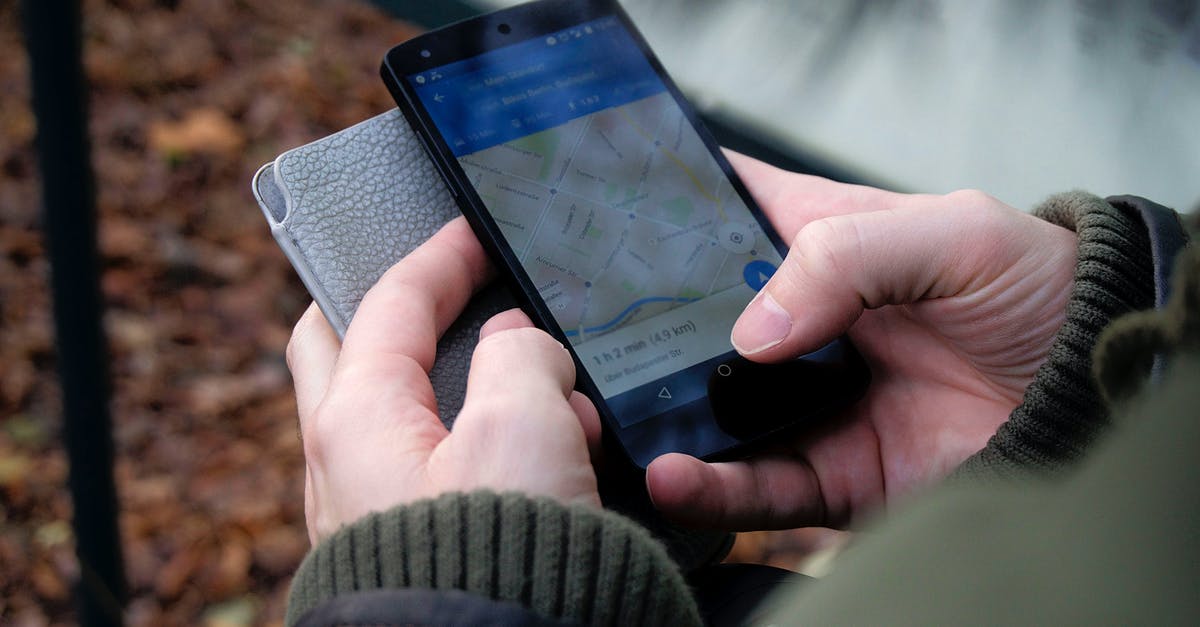 Google maps in China - Person Using Google Maps Application Through Black Android Smartphone