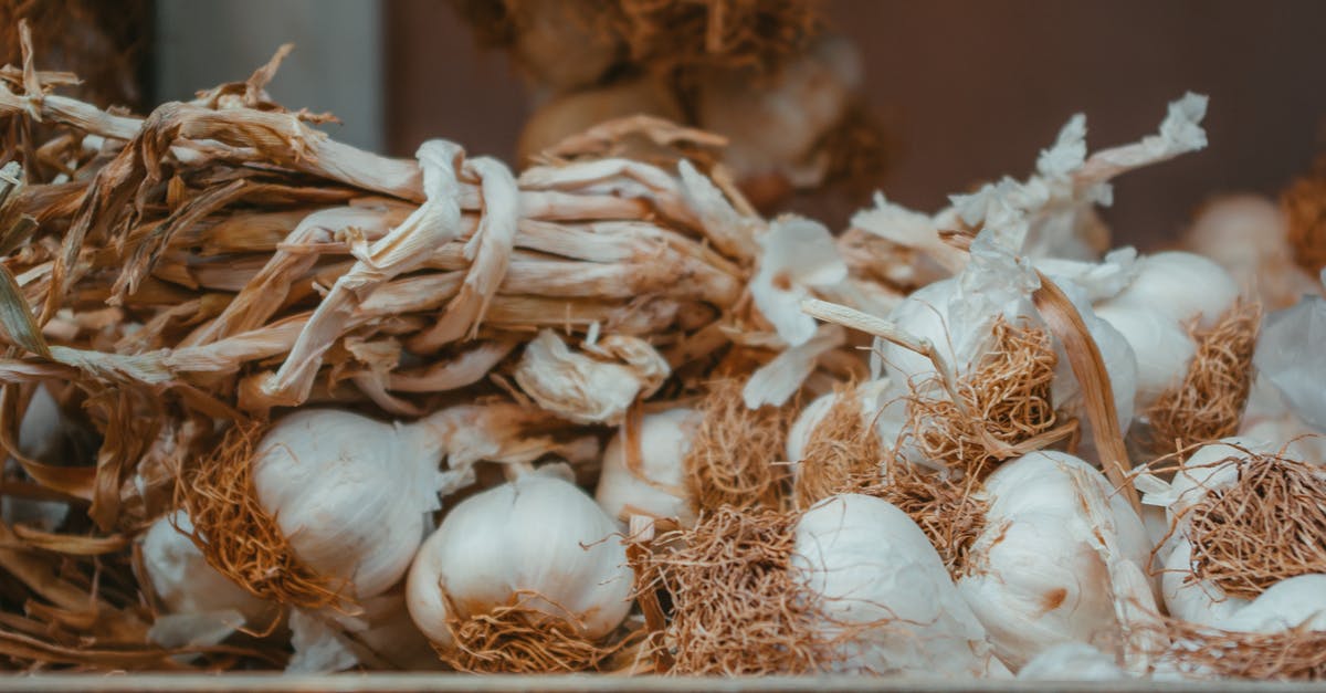 Group Discounted Airfare [closed] - White Garlic on Brown Wooden Table