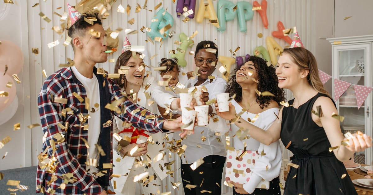 Guests at a motel - Family and Group of Friends Celebrating a Child's Birthday