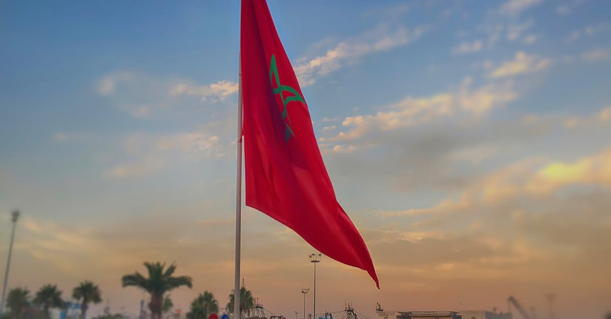 Guinea Bissau national transiting in Morocco - Close-Up Photo of the Morocco Flag 