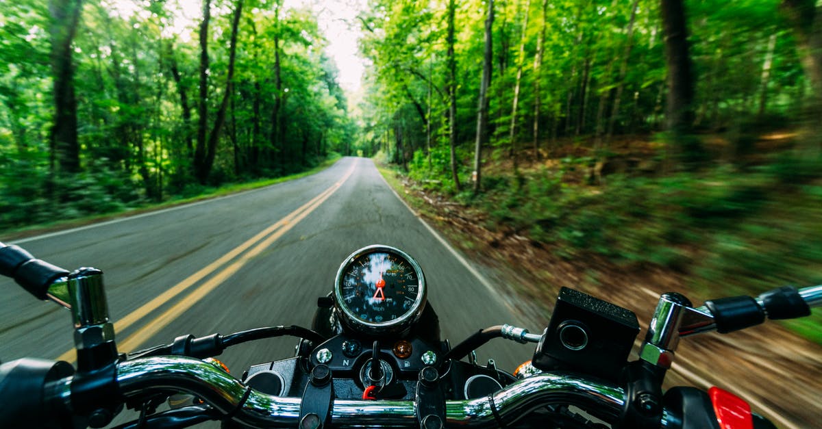 Hamburg and surroundings, cost of year-long transportation ticket? [closed] - Person Riding Black and Gray Motorcycle on Road