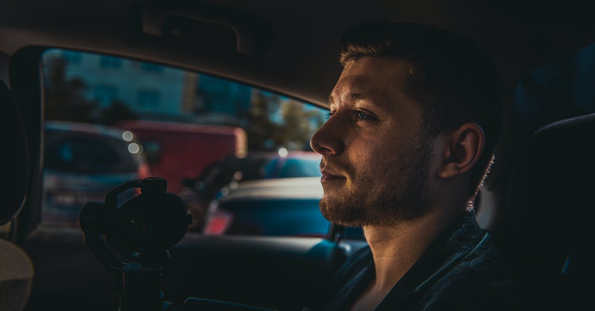 Hanoi: 1.8 million VND taxi fare? [closed] - Man Sitting At the Back Holding a Camera