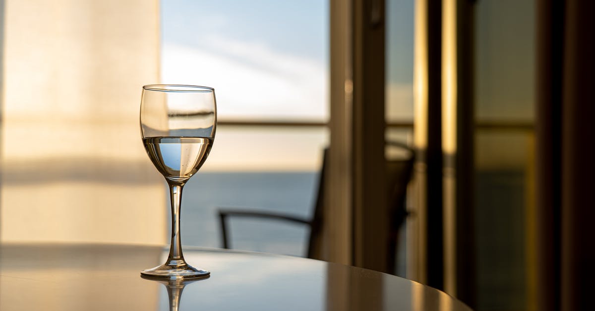 Having a pleasant dining experience in a hotel with a baby? - A Wine Glass On Dining Table