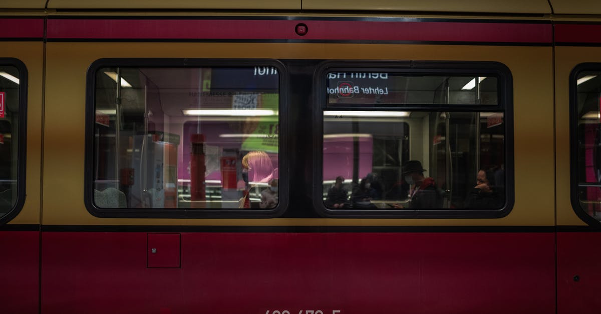 Heathrow T3 to Euston Station - People in Red Train