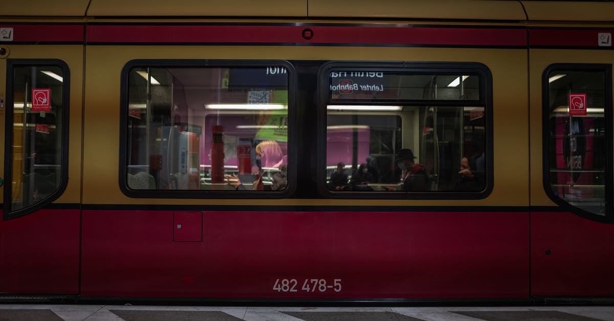 Heathrow T3 to Euston Station - Red and Black Train in Train Station