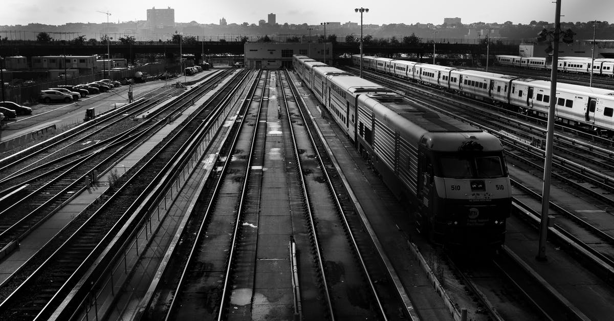 High-speed railway line usage (Germany) [closed] - Gray Scale Photo of Train