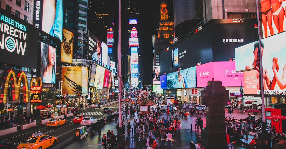 How busy is New York City on New Year's Eve? - People Walking on Street during Night Time