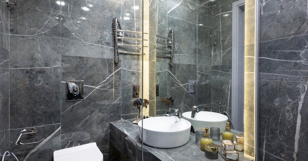 How can AA elite members get upgraded on a domestic codeshare? - Modern bathroom interior with toiletry products at home