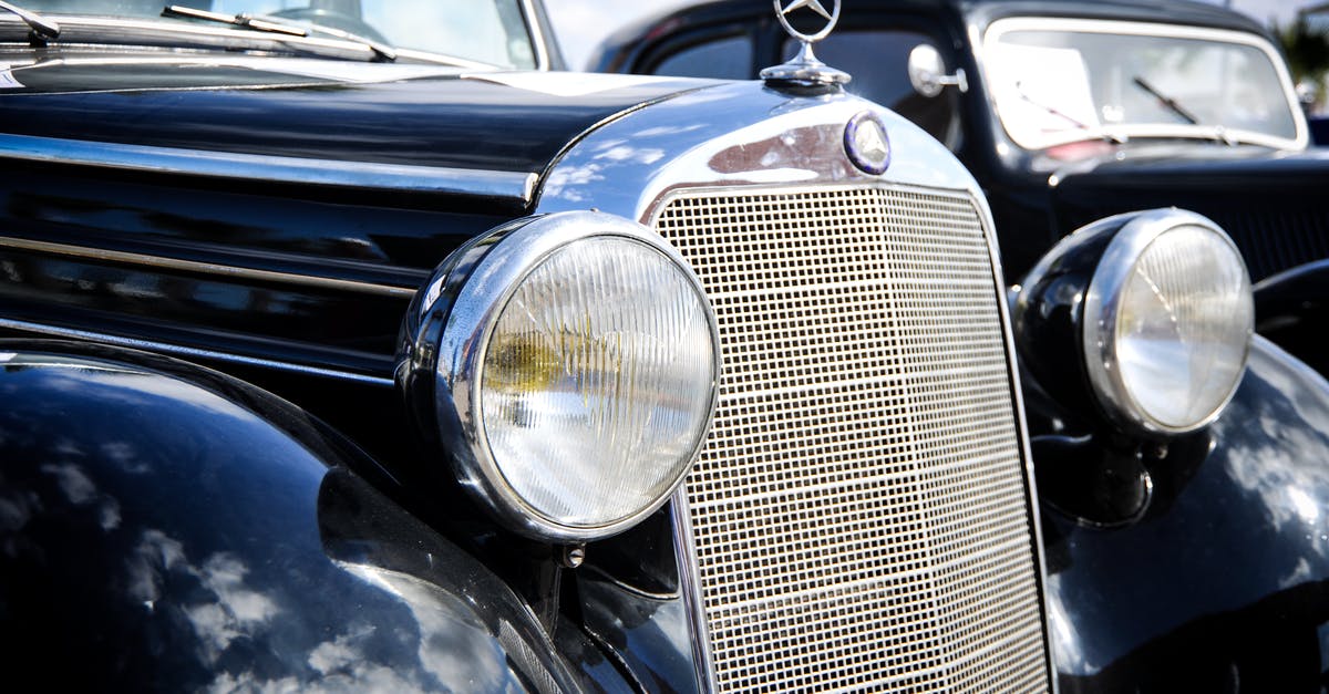 How can I add headlights to a rented car? - Grayscale Photo of Vintage Car