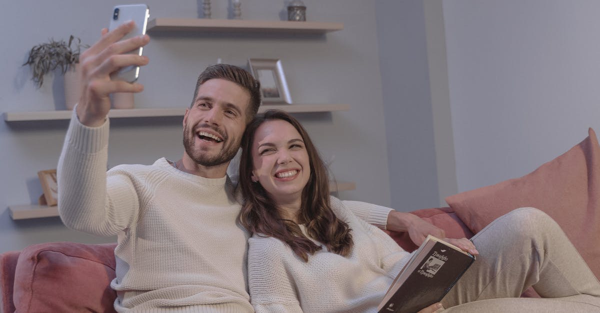 How can I book flights online with separate airlines? [closed] - A Happy Couple Taking a Selfie