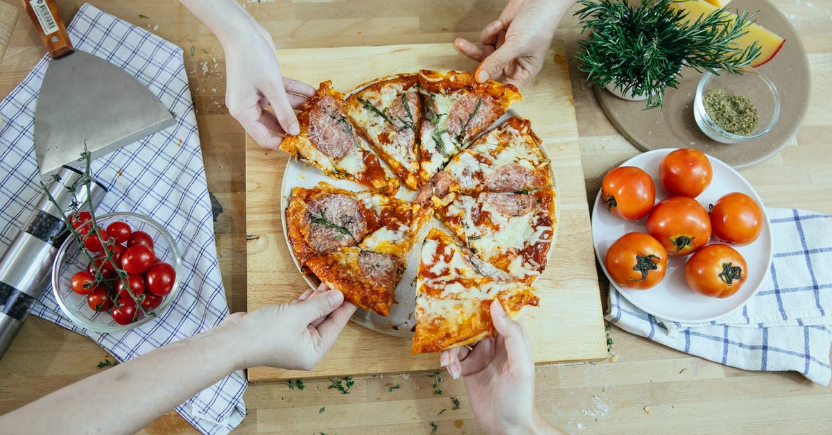 How can I determine if there's a way I can legally take home a piece of a particular landmark? - From above unrecognizable people taking slices of pizza with salami melted cheese and herbs from plate on kitchen table How can I determine if there's a way I can legally take home a piece of a particular landmark? - From above unrecognizable people taking slices of pizza with salami melted cheese and herbs from plate on kitchen table