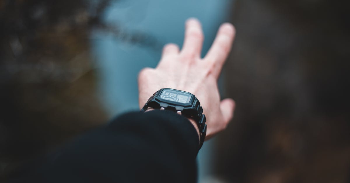 How can I get a bank statement for tourist visas while traveling? - Crop man outstretched hand reaching out for waterfall in nature How can I get a bank statement for tourist visas while traveling? - Crop man outstretched hand reaching out for waterfall in nature