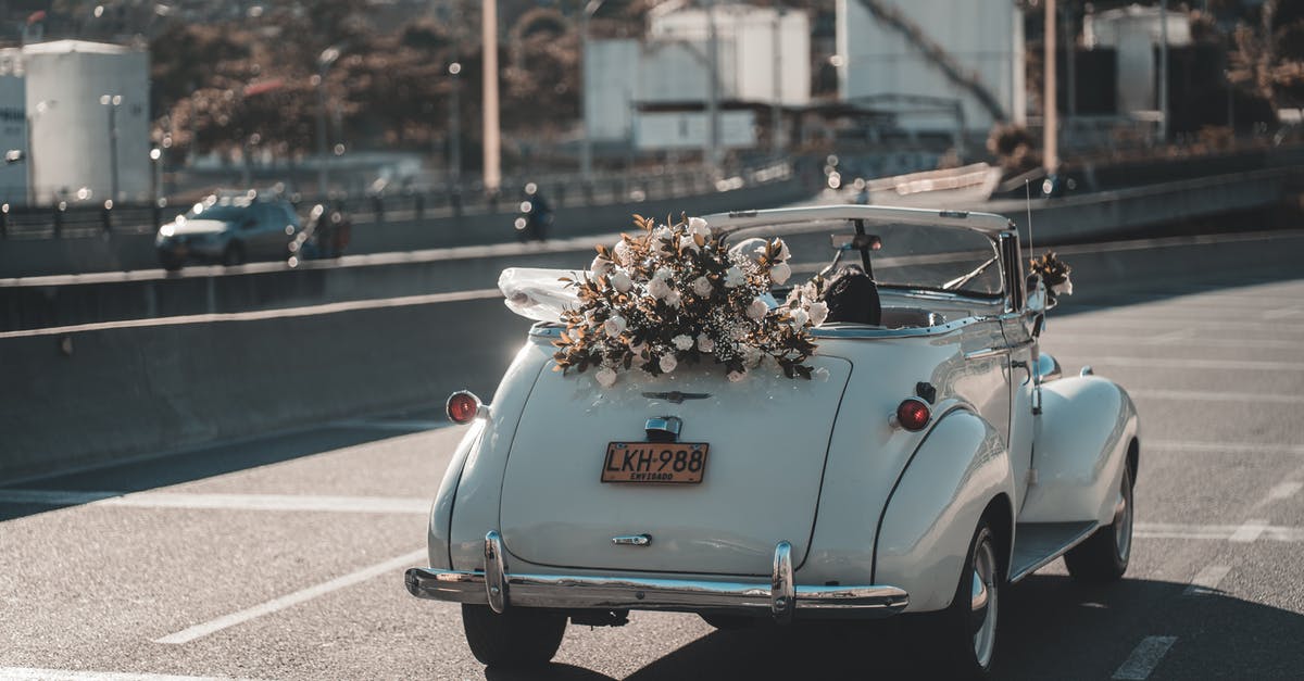 How can I get an elevation profile of a driving route - Retro wedding cabriolet driving on road