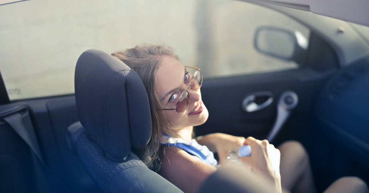 (How) Can I hire an instructor as a tourist driver on the Nürburgring without renting a car? - Modern woman on passenger seat in convertible (How) Can I hire an instructor as a tourist driver on the Nürburgring without renting a car? - Modern woman on passenger seat in convertible