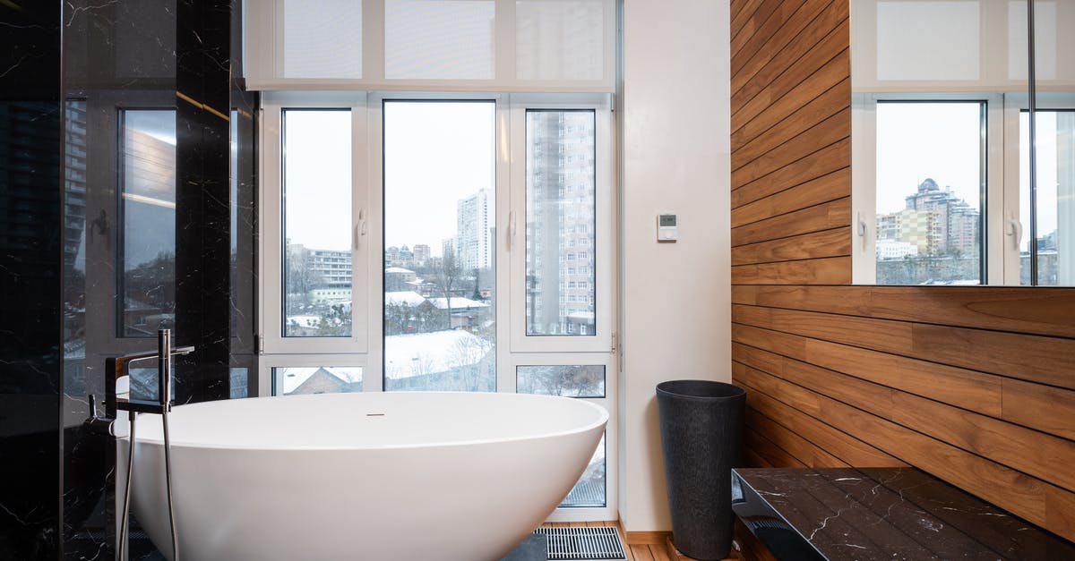 How can I know in advance if a private bathroom is not en suite? - Modern bathroom interior with panoramic window
