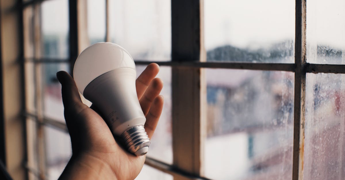How can I know with Aegean Airlines if I have Economy Light or Economy ComfortFlex fare? - Person holding electric light bulb near window How can I know with Aegean Airlines if I have Economy Light or Economy ComfortFlex fare? - Person holding electric light bulb near window